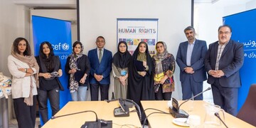 Winner of the journalism category in the UNICEF-Iran cultural competition and the organizers pose at the UNICEF Iran office in Tehran on June 20, 2023. (UNICEF/Andisheh Rad)