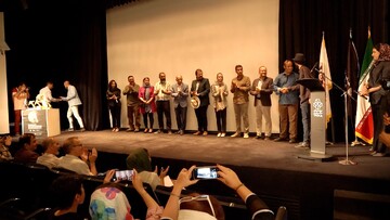 Members of the jury award winners during the 5 International Photo Award at the Tehran Museum of Contemporary Art on June 22, 2023. (Fatemeh Sobati)