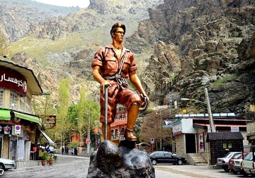 Darband mountaineer,  a memorable statue in northern Tehran, named national heritage