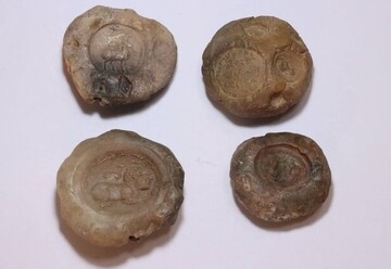 Centuries-old clay seals depicting lifelike, mythical figures restored