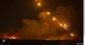 A photo showing Hamas firing rockets at Israel