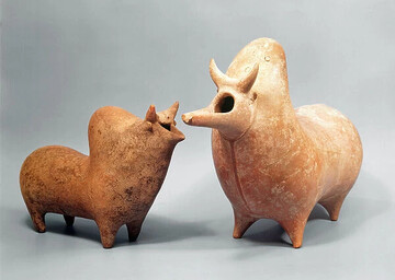 Two burnished baked clay vessels in the shape of zebus (bull) Amlash, Iran c.1400-1000 BC (terracotta) by Iranian School; height:39 cm; Ashmolean Museum, University of Oxford, UK