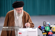 Iranians vote in parliamentary runoff as Leader calls for strong voter turnout