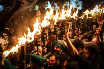 While carrying the torch, or Mashaal, the men sing the song of mourning, called Nohe (Photo credit: Mohammad Ali Najib/Al Jazeera)