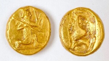 Persian darics were gold coins minted by the Persian Empire and feature the image of a crouched archer. (Image credit: Notion Archaeological Project, University of Michigan)