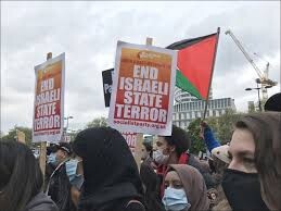 A file photo showing demonstrators urging the world to end Israeli state terrorism