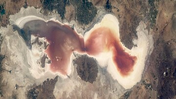 Satellite image showing Lake Urmia shades of red and orange