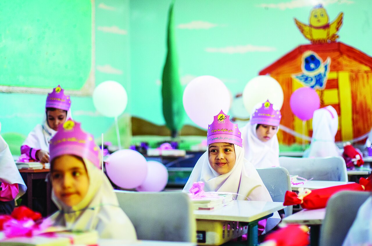 First graders attend schools in Tehran