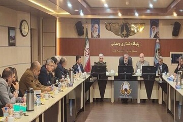 Members of the Iranian Parliament’s National Security and Foreign Policy Committee during a meeting with the commanders of the Vahdati Airbase in Dezful