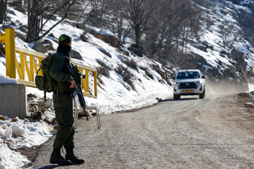 An Israeli soldier standing guard at the Hermon ski resort during a media tour organized by the spokesman of the Israeli military, in the Israeli-annexed Golan Heights, on Wednesday.Credit...Jalaa Mar