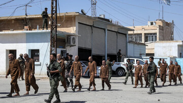 Former detainees suspected of being members of ISIS are released in Syria's northeastern city of Hasakeh on September 2, 2024. (Photo by Delil souleiman / AFP) Delil Souleiman/