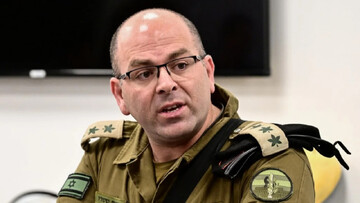 Colonel Moshe Tetro holds a press conference at the Kerem Shalom border crossing with the southern Gaza Strip on 22 December 2023 (AFP)