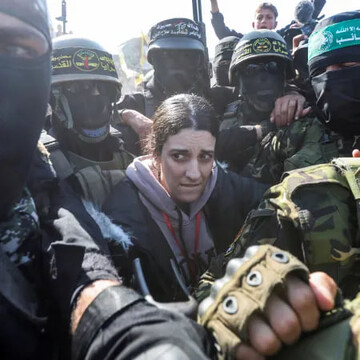 Israeli female soldier Arbel Yehud is released as she is surrounded by a number of Gaza's resistance fighters