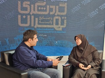 Fatemeh Mohajerani, the spokeswoman for the government, talks to the Tehran Times during her visit to the 18th Tehran International Tourism and Related Industries Exhibition on February 13, 2025.