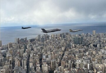 Israeli fighters fly over the people holding funeral for Hezbollah chief Nasrallah in Beirut