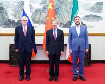 Chinese Foreign Minister Wang Yi meets with Russian Deputy Foreign Minister Ryabkov Sergey Alexeevich and Iranian Deputy Foreign Minister Kazem Gharibabadi in Beijing on March 14, 2025.