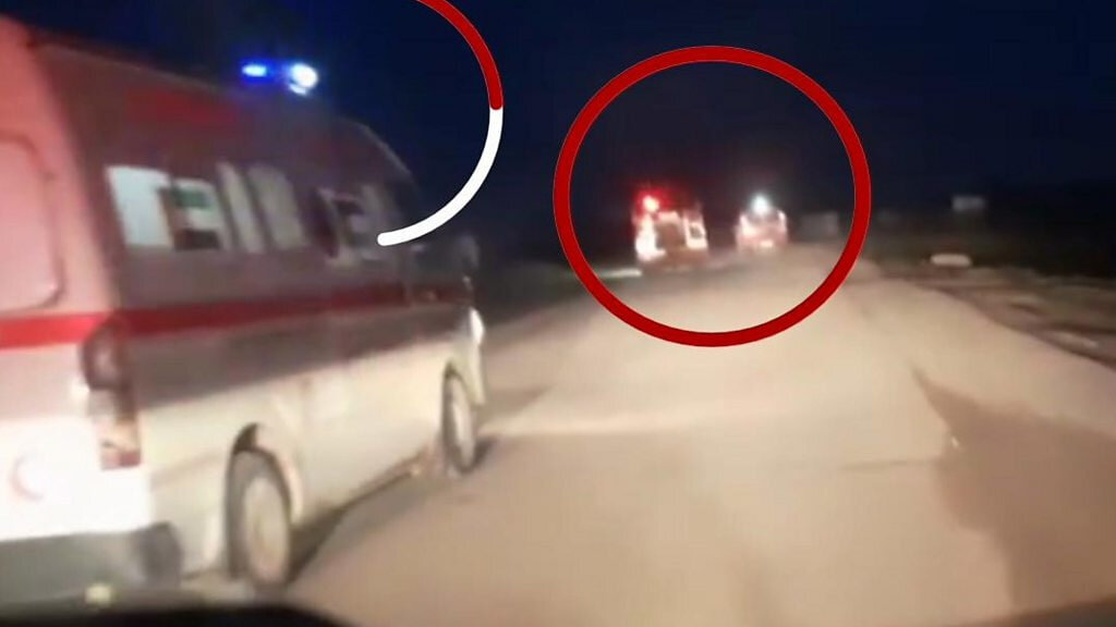 Red Crescent ambulances had their emergency signals on lights on