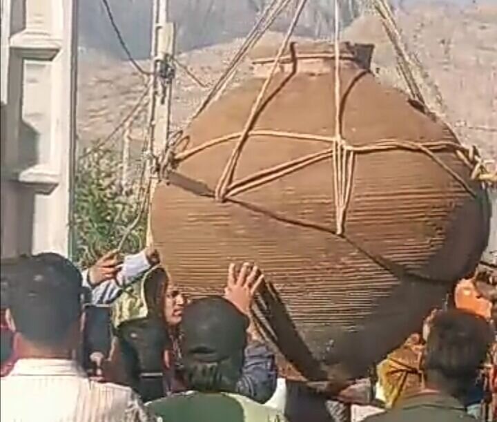 A giant jar recently unearthed in the Jelowdar rural district of Fars province, southern Iran, is transferred to Persepolis for examination and initial restoration, April 7, 2025.