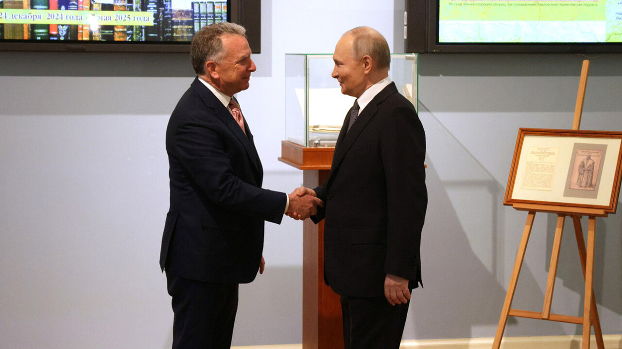 United States' Steve Witkoff and Vladimir Putin shake hand