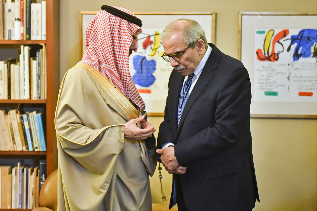 Saudi FM Prince Faisal bin Farhan talking to Lebanon's PM Nawaf Salam