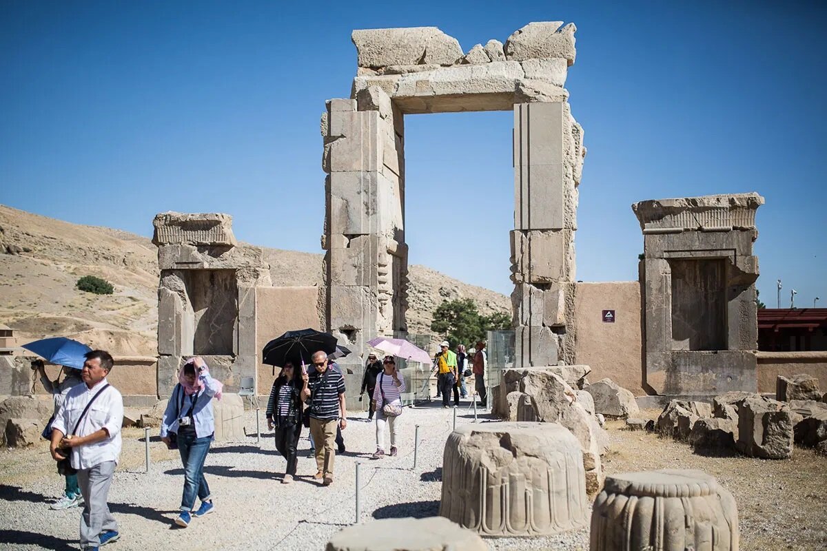 Sightseers visit the ruins of Persepolis in southern Iran.