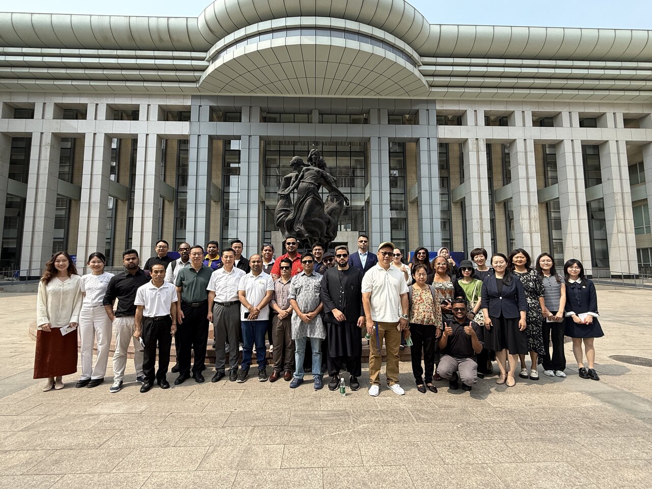 On June 13, 2025, international journalists gathered for a photograph at Beijing Dongzhimen Middle School