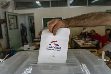 Why do the Lebanese Forces want to amend electoral law?