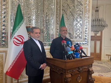 Iranian President Masoud Pezeshkian (R) addresses senior diplomats at the Ministry of Foreign Affairs of Iran in the capital Tehran on July 26, 2025.