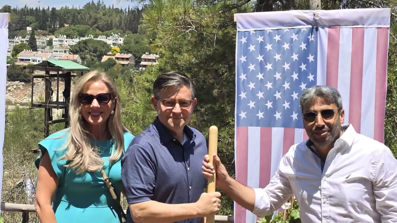 Mike Johnson, left, and Yair Chetboun tour the settlement of Ariel on August 4, 2025. (Courtesy, Ariel Municipal Authority)