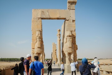 People visit the Gate of All Nations within the UNESCO-registered Persepolis in Fars province, southern Iran.