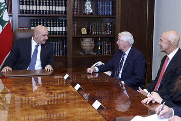 In this photo released by the Lebanese Presidency press office, Lebanese President Joseph Aoun, left, meets with U.S. Sen. Lindsey Graham, R-S.C., center, and U.S. Ambassador to Turkey and Special Envoy to Syria Tom Barrack, right, at the presidential palace in Baabda, in east of Beirut, Lebanon, Tuesday, Aug. 26, 2025. (Lebanese Presidency press office via AP)
