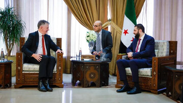 Ahmed al-Sharaa and Jonathan Powell