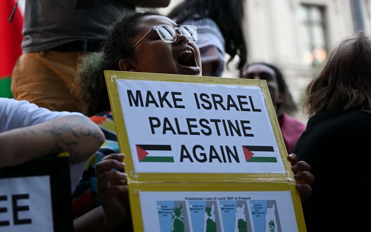Girl holding an anti-Israel sign