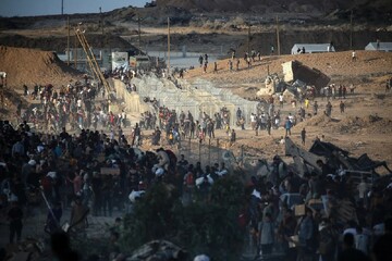 Palestinians at an aid distribution point set up by the GHF, near the Nuseirat refugee camp in the central Gaza Strip on June 25.Photo: AFP 