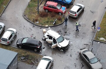 The damaged Kia Sorento lies at the scene where Lieutenant General Fanil Sarvarov, head of the Russian General Staff's army operational training directorate, was killed in a car bomb in Moscow, Russia, December 22, 2025 (Reuters)