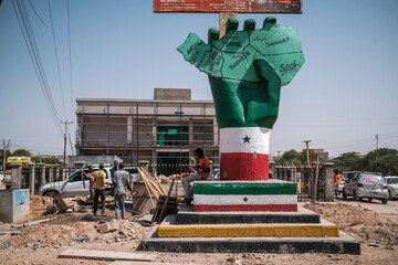 Monument in Somaliland’s Hargeisa depicts a hand holding a map of the area (AFP)