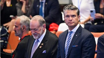 U.S. Ambassador to Israel Mike Huckabee (left) and U.S. Secretary of War Pete Hegseth in the Knesset, Jerusalem, in October 2025 (AFP)