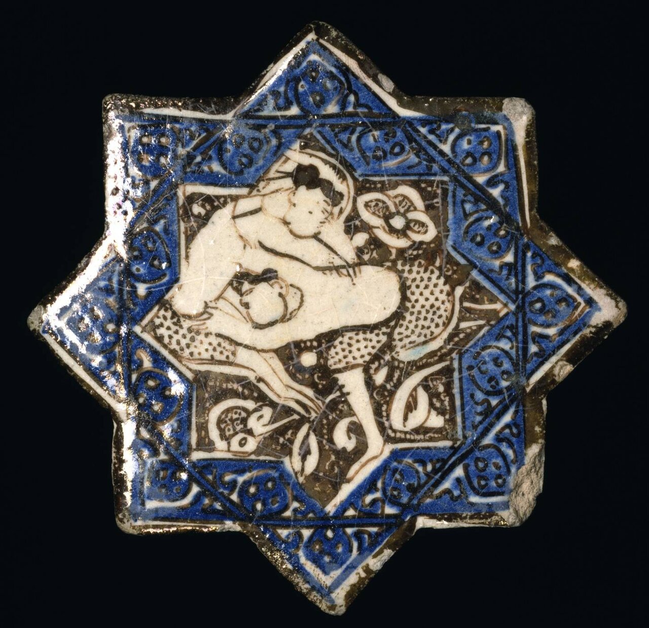 Wrestlers of the 7th century AH: When sport became eternal in an Ilkhanid luster tile