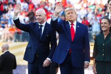 FIFA President Gianni Infantino and Trump wave hands to well-wishers
