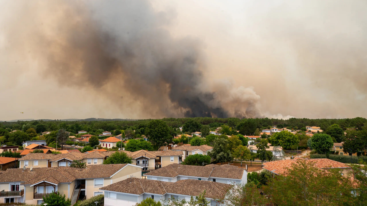 80,000 flee raging wildfires in France and Spain