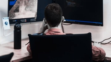 Israeli soldier behind a PC